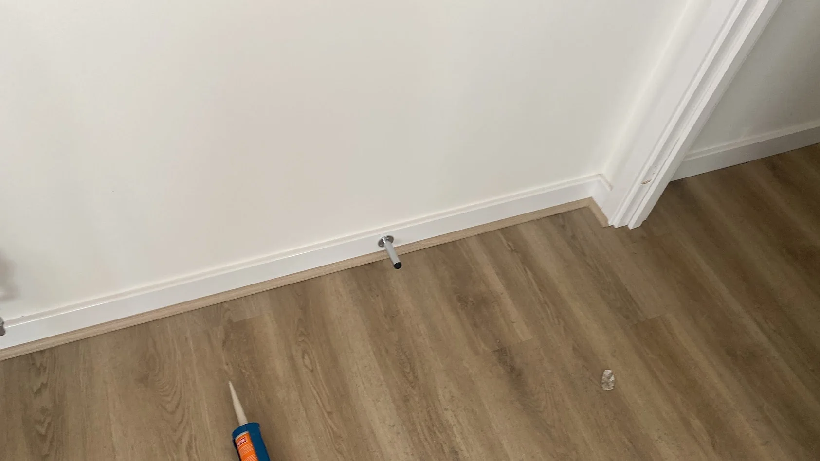 Flooring and skirting finishing detail during installation