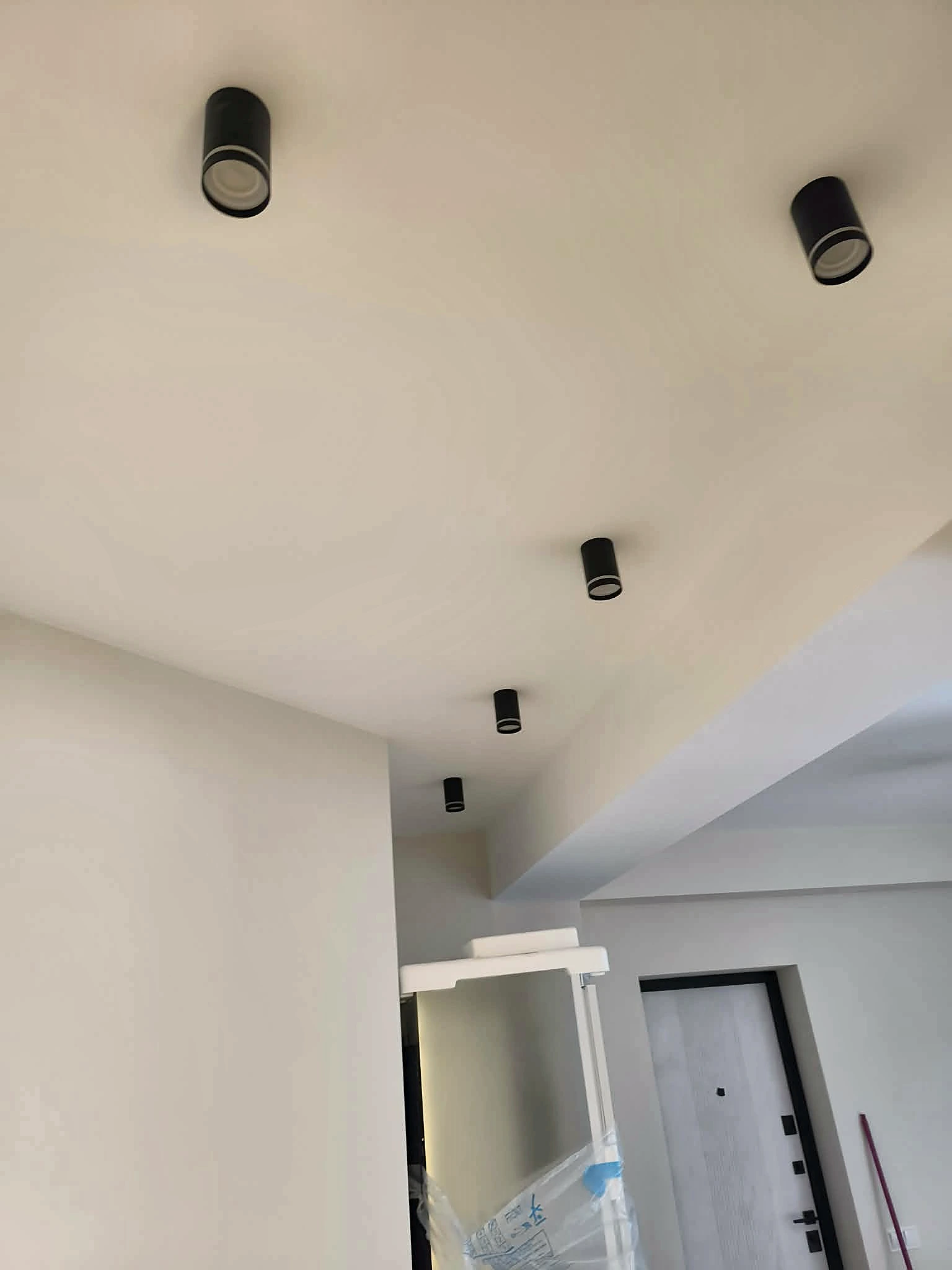 Finished ceiling and wall decoration with feature lighting