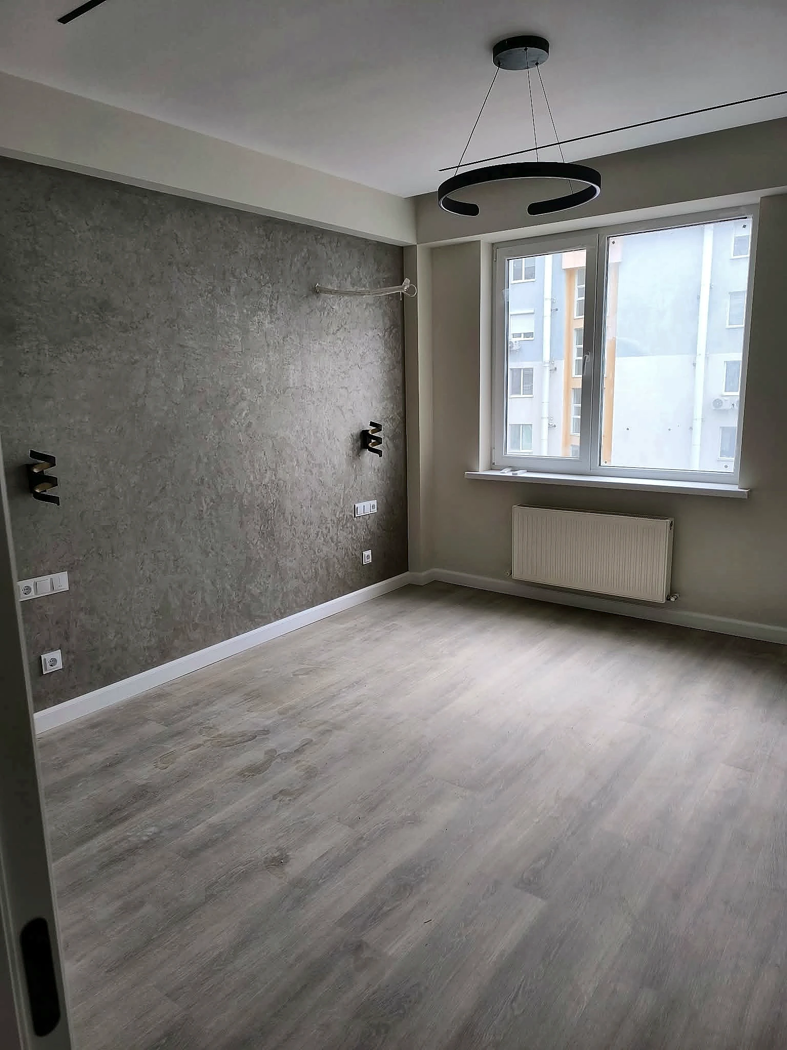 Completed room with textured feature wall