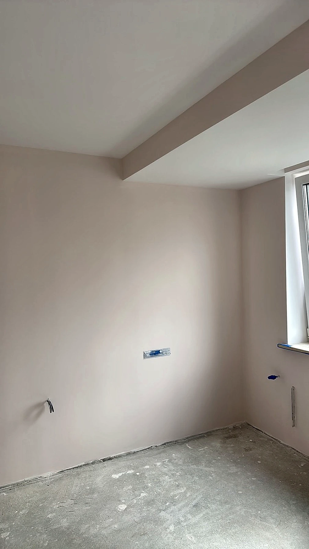 Walls prepared and painted before final flooring