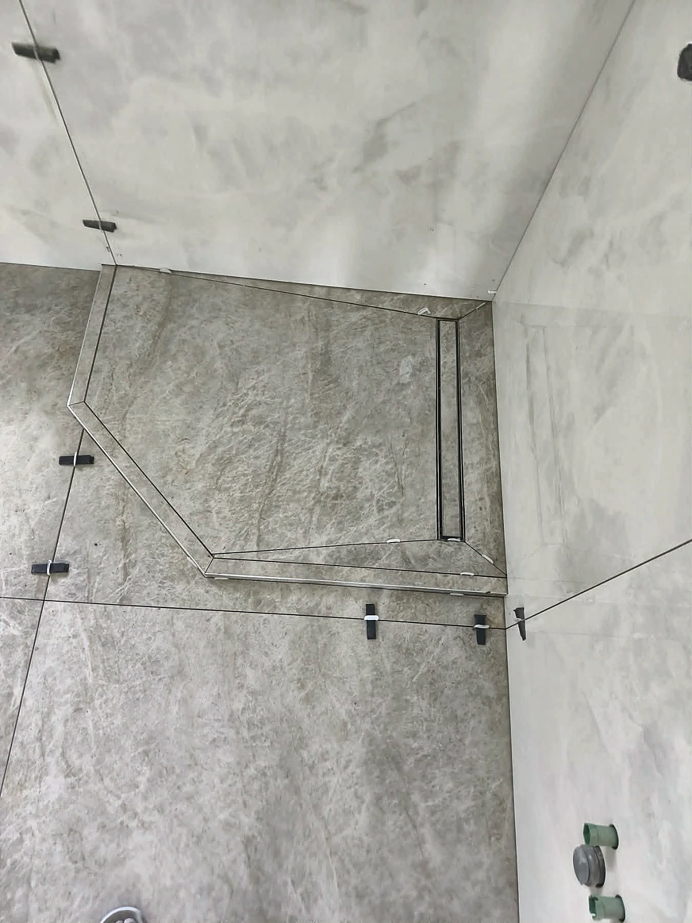Shower area set out with levelling clips