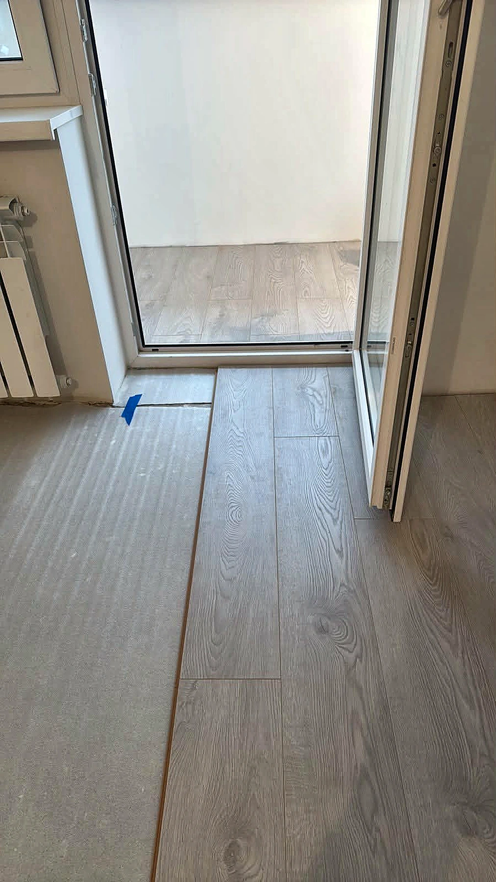 Flooring installation and threshold detailing