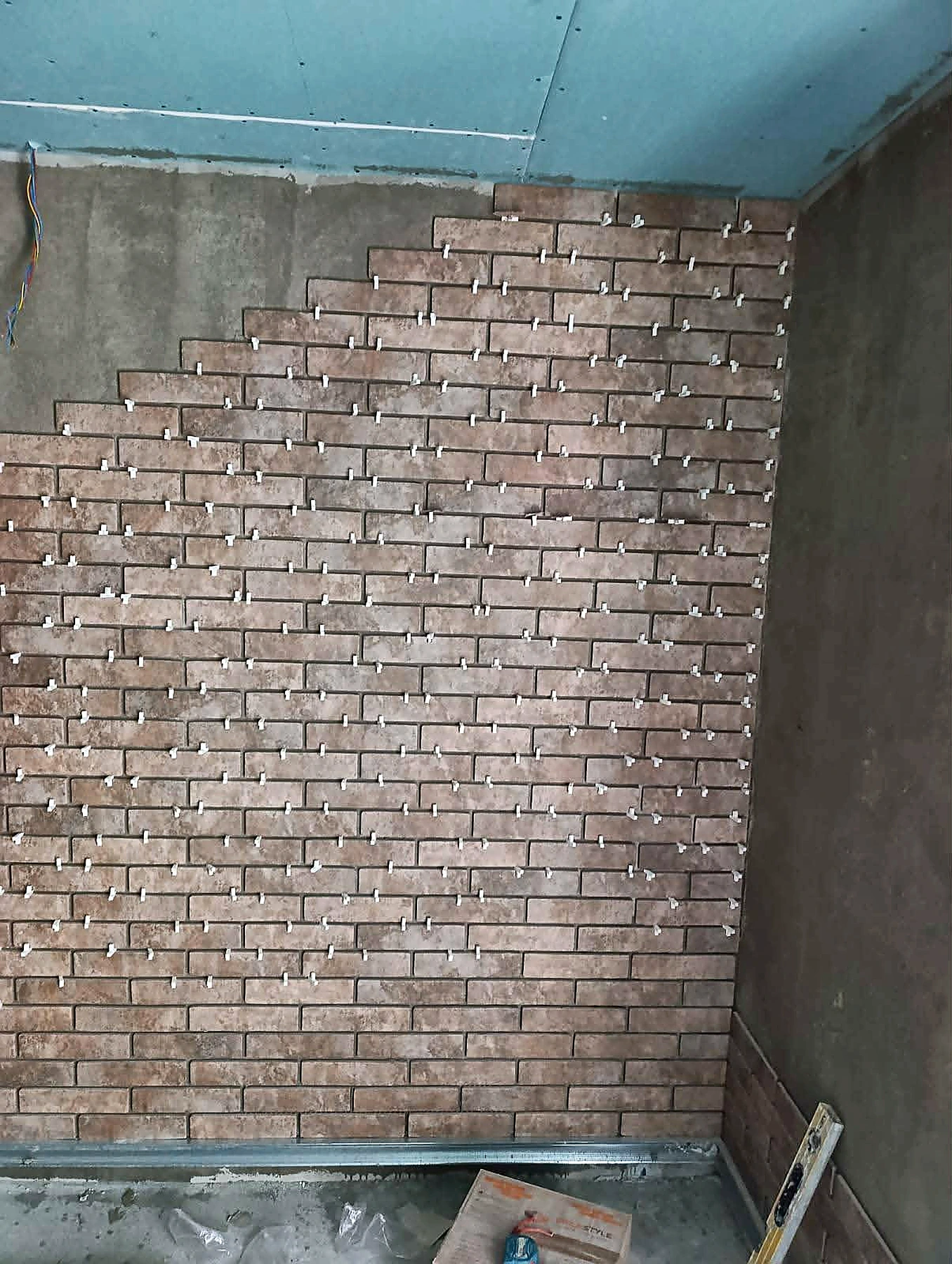 Brick feature wall installation and spacing