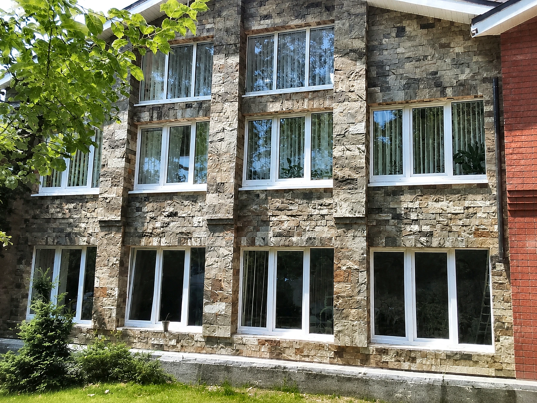 Completed exterior natural-stone cladding