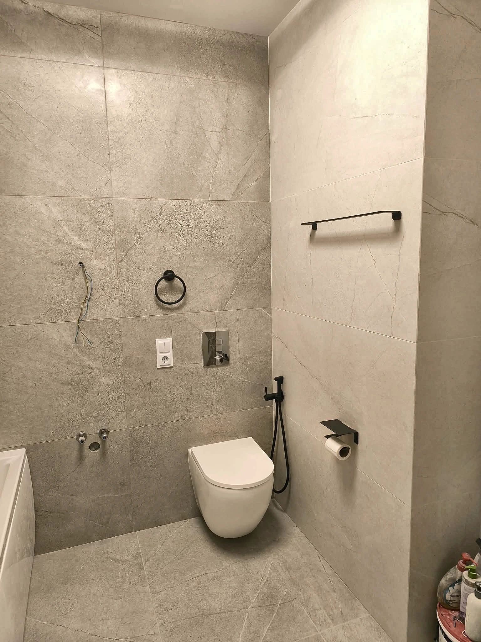 Completed large-format wall and floor tiling