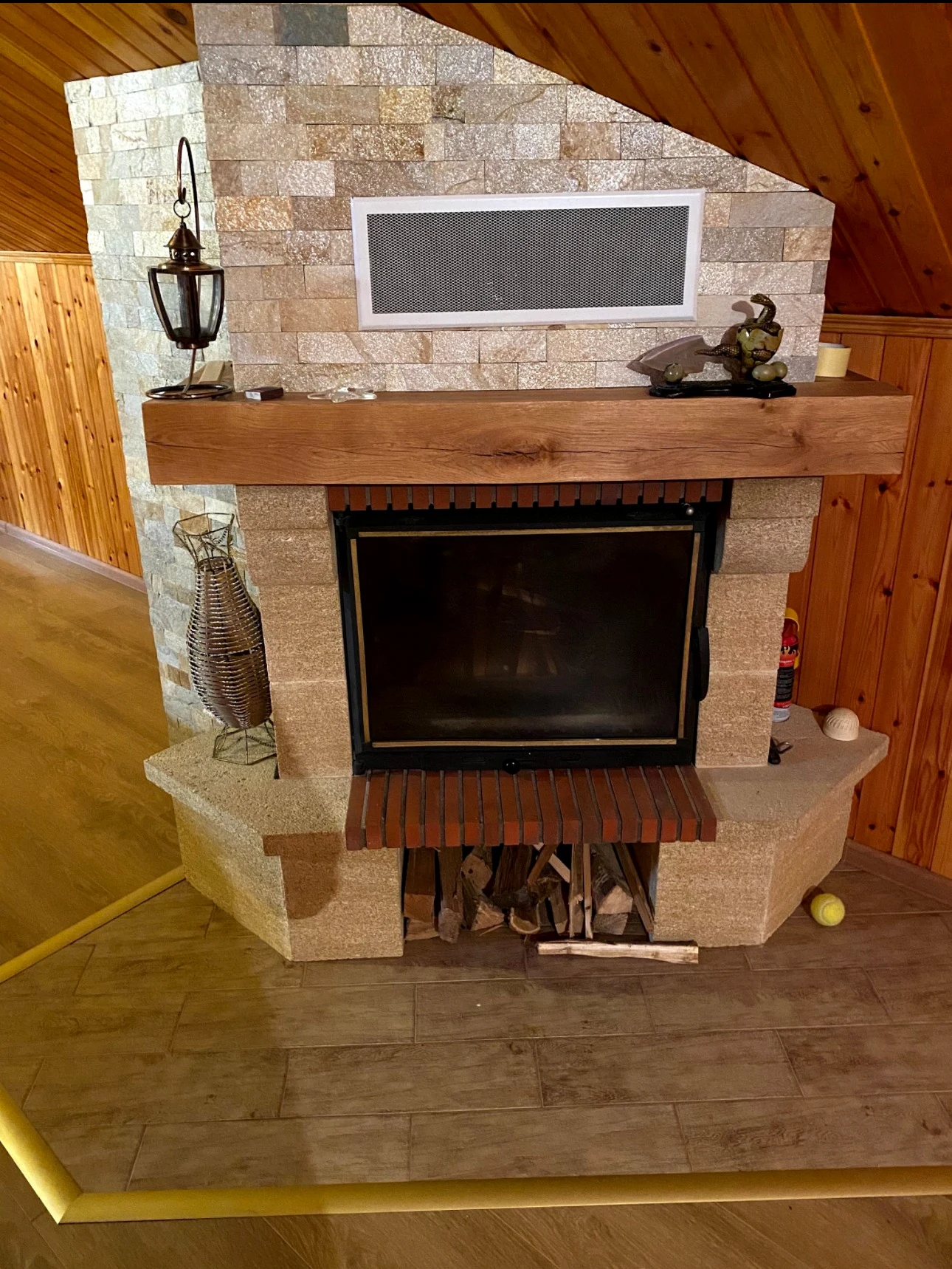 Decorative stone cladding around a fireplace